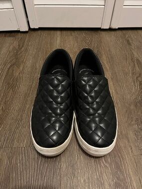 Quilted Slip-On Sneakers in Black with White Sole